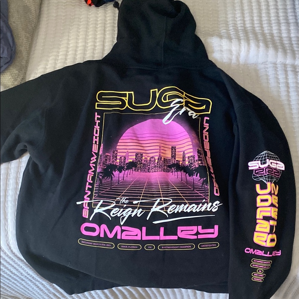 Sean O’Malley UFC 299 Black Hoodie with Pink and Yellow Graphics. Size Large
